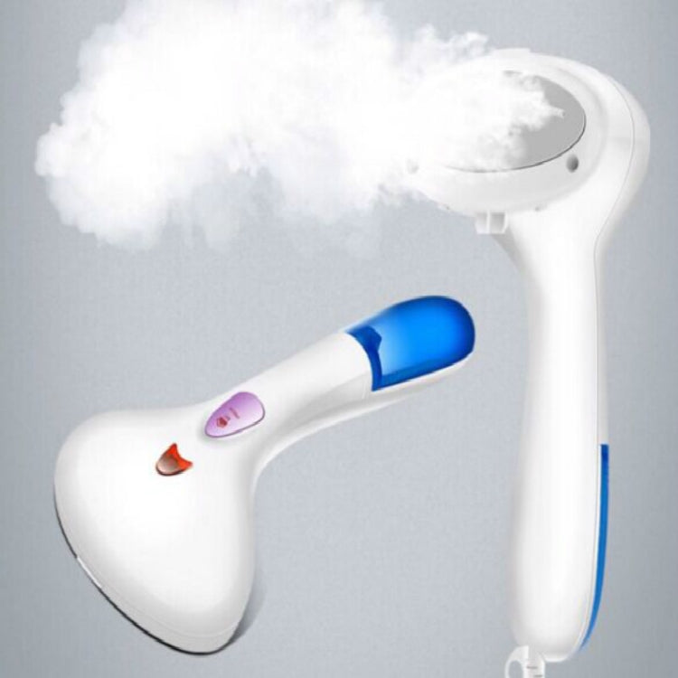 White handheld clothes steamer releasing steam with blue indicator on handle