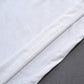 White T-shirt hem close-up with stitched edge and side seam