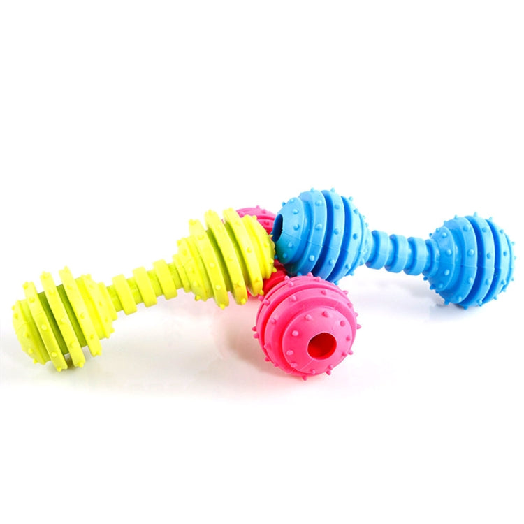 Multi-color TPR bite-resistant dumbbell dog toys laid out: yellow, blue, and pink