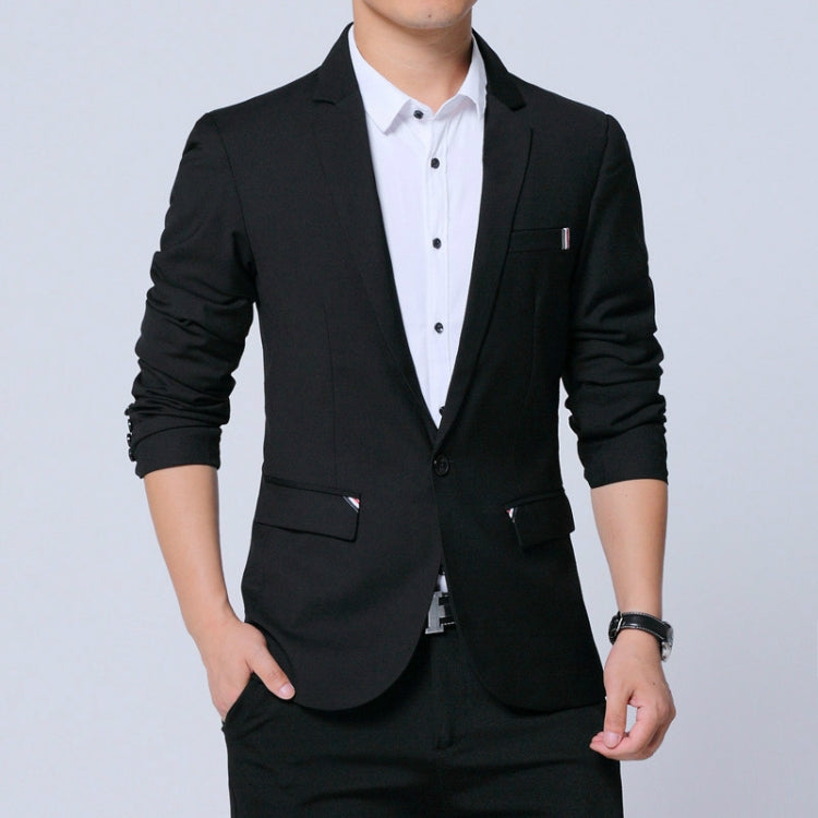 Men's black blazer with two side pockets, worn over white button-up shirt