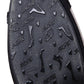 Close-up of black textured outsole with embossed grip pattern