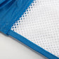 Blue float hammock detail with white mesh net and stitched edge