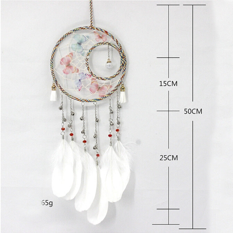 Hand-woven dream catcher with sun and moon hoops, beaded strands, and white feathers