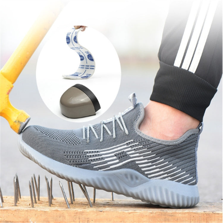 Grey men’s lace-up work shoe with grippy sole and breathable knit upper