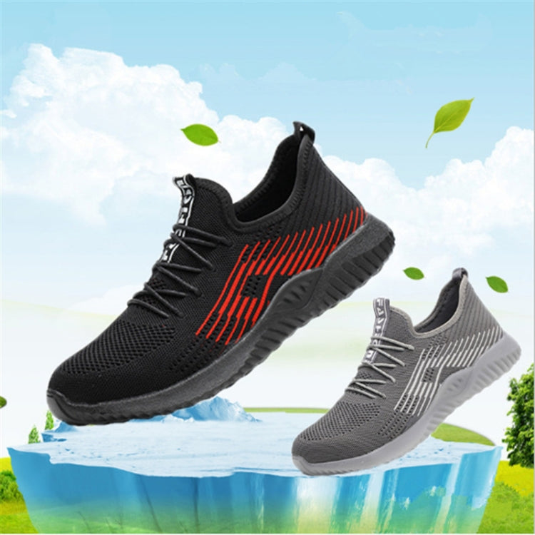 Black men’s work sneakers with red stripe detail, knit upper, and cushioned outsole