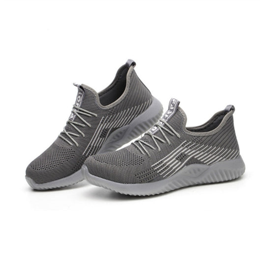 Grey men’s work sneakers with elastic knit upper, lace-up design, and cushioned sole