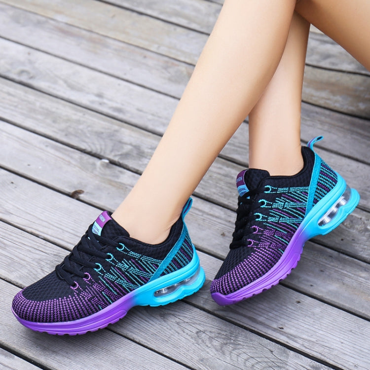 Women’s lace-up sneakers with black-and-purple knit mesh uppers and teal air sole