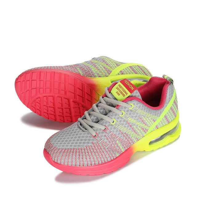 Women’s mesh running sneakers, grey knit with neon yellow heel and pink-red outsole
