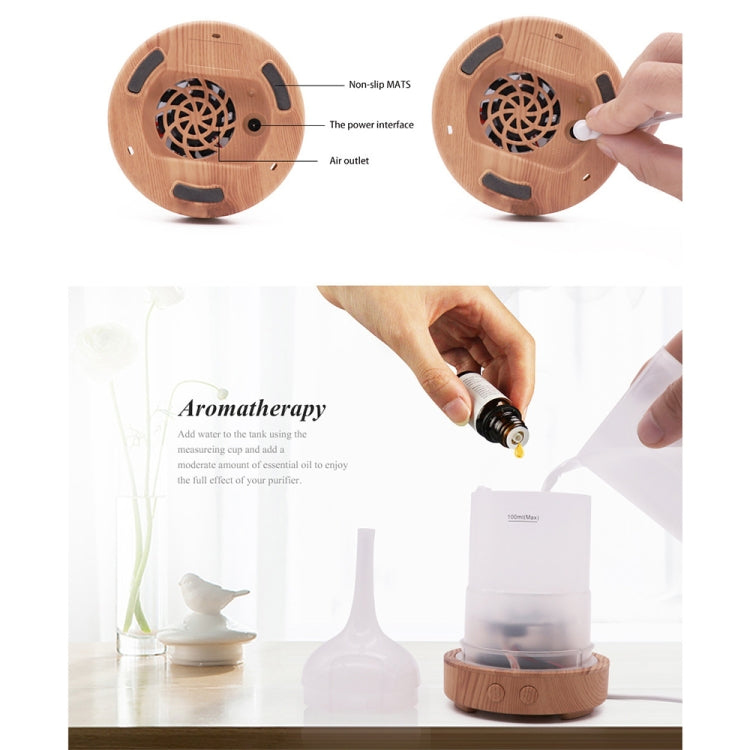 Aroma humidifier base with air outlet and non-slip pads, plus scent tank and cover shown