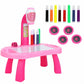 Pink learning painting table set with projector, colored pens, and four stamp wheels