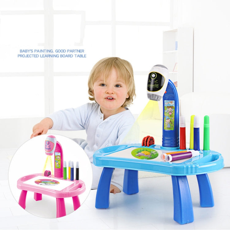 Kids painting projector drawing table with pink and blue stands, markers, and stamp wheels