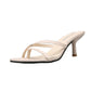 Beige pin-toe stiletto heeled sandals with two slim thong straps