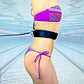 Swimming resistance belt worn on swimmer’s upper arm and waist with elastic rope