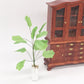 Mini dollhouse banana tree plant, green leaves with white pebble base vase