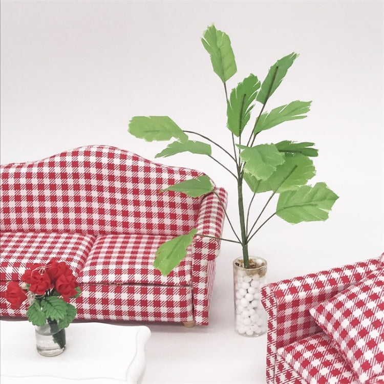 Mini dollhouse banana tree plant with green leaves and white pebble vase