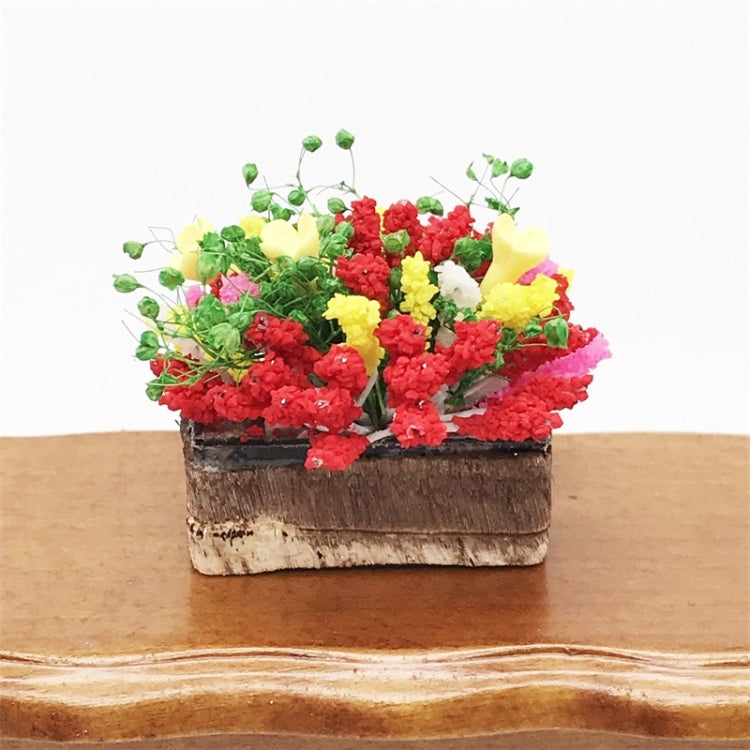Mini clay flower arrangement in rectangular planter, red and yellow blooms with green stems