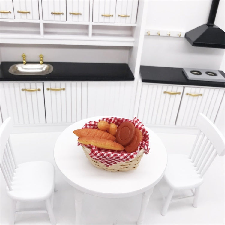 Mini dollhouse bread basket with red plaid cloth liner, mini bread slices and rolls