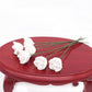 Mini white rose heads with thin green stems