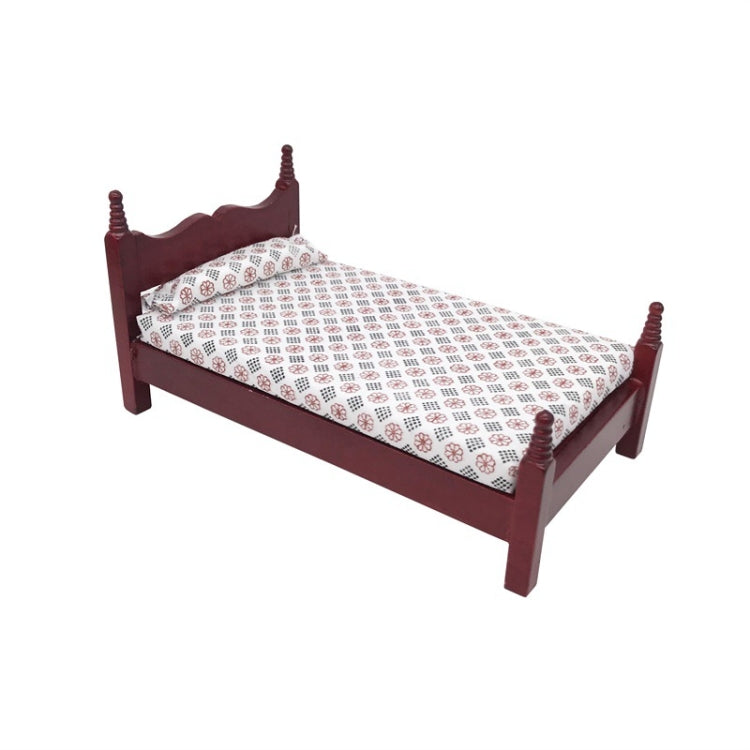 Mini dollhouse single bed toy with dark maroon side rails and patterned white mattress