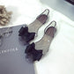 Transparent jelly flat shoes with black bow, round toe and slingback strap