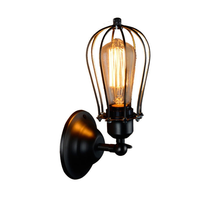 Wall lantern light with black backplate, amber Edison-style bulb in clear glass cage