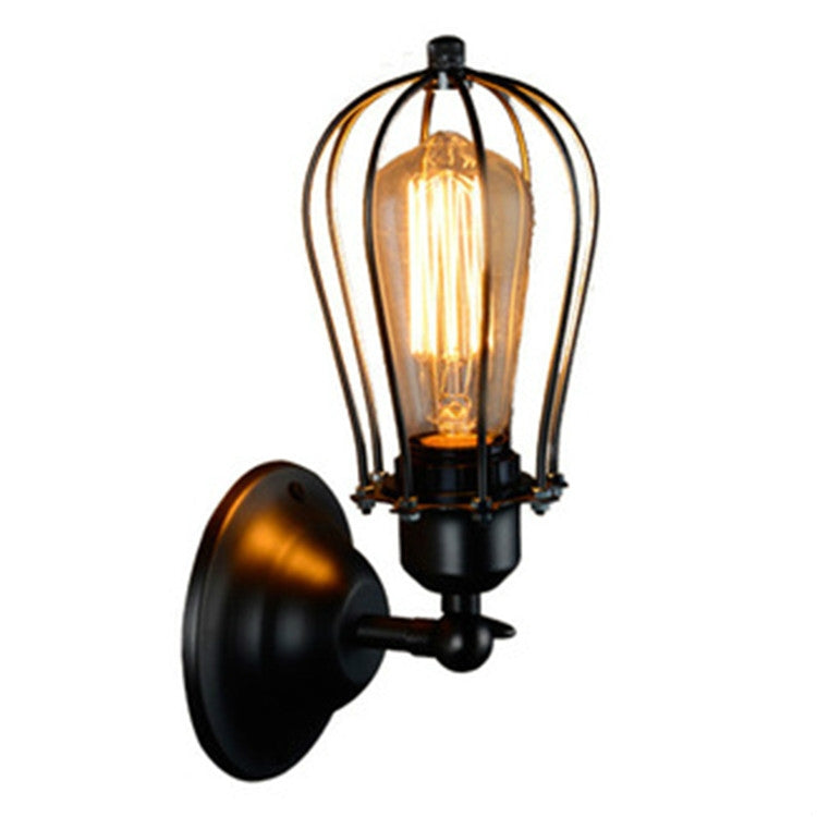 Wall lantern light with black metal backplate, clear glass cage, Edison-style bulb