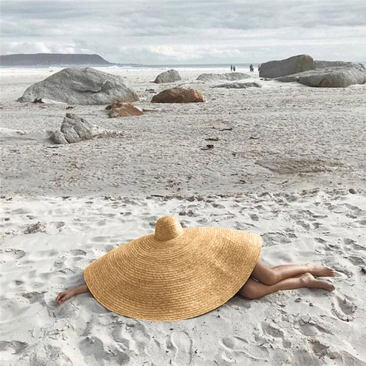 Beige wide-brim woven straw sun hat with deep crown