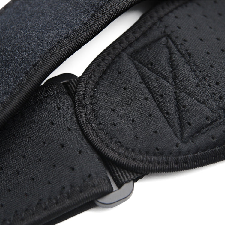 Black padded shoulder guard close-up with perforations and curved anti-scratch padding.