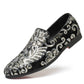 Glitter sequin slip-on loafer with black uppers and silver swirling filigree