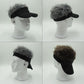 Black visor cap with shaggy wig hair, shown in multiple mannequin angles.