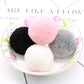 Mixed-color faux fur pom-pom balls: pink, black, gray, white