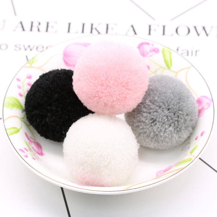 Mixed-color faux fur pom-pom balls: pink, black, gray, white