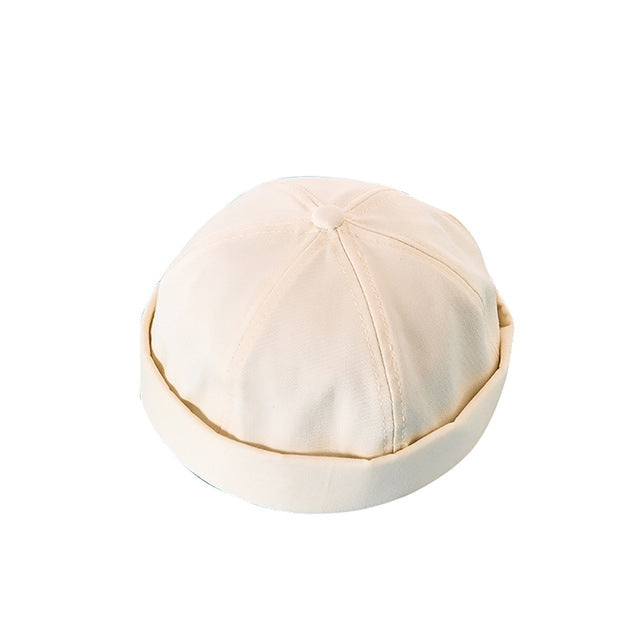 Light cream cotton-linen landlord hat, paneled crown with adjustable strap