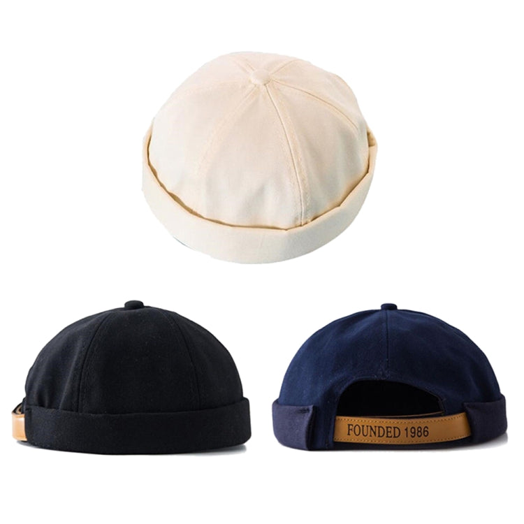 Adjustable landlord hats in light cream, black, and navy with tan "FOUNDED 1986" bands