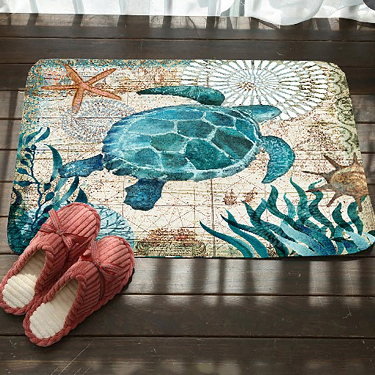 Marine toilet mat with blue sea turtle and whale, starfish accents, non-slip backing