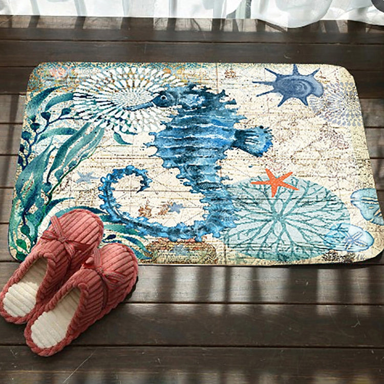 Marine toilet mat with blue whale and starfish, textured seascape print, non-slip