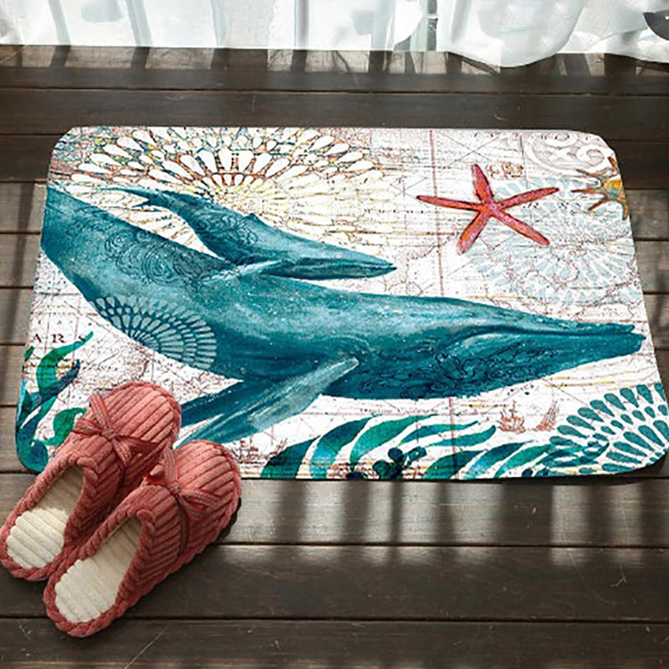 Whale and starfish printed flannel bath mat with non-slip backing, teal and cream