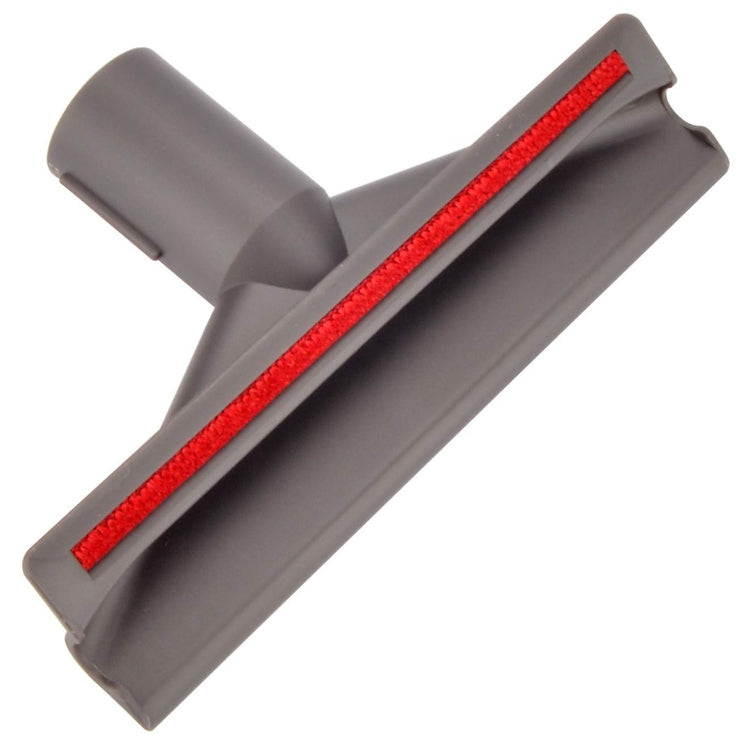 Gray vacuum upholstery brush head with long red bristle strip