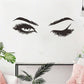 Two black stylized eye decals and eyebrow shapes wall sticker set.