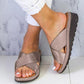 Women’s slip-on slide sandals with open toe and taupe metallic cross straps, cushioned sole