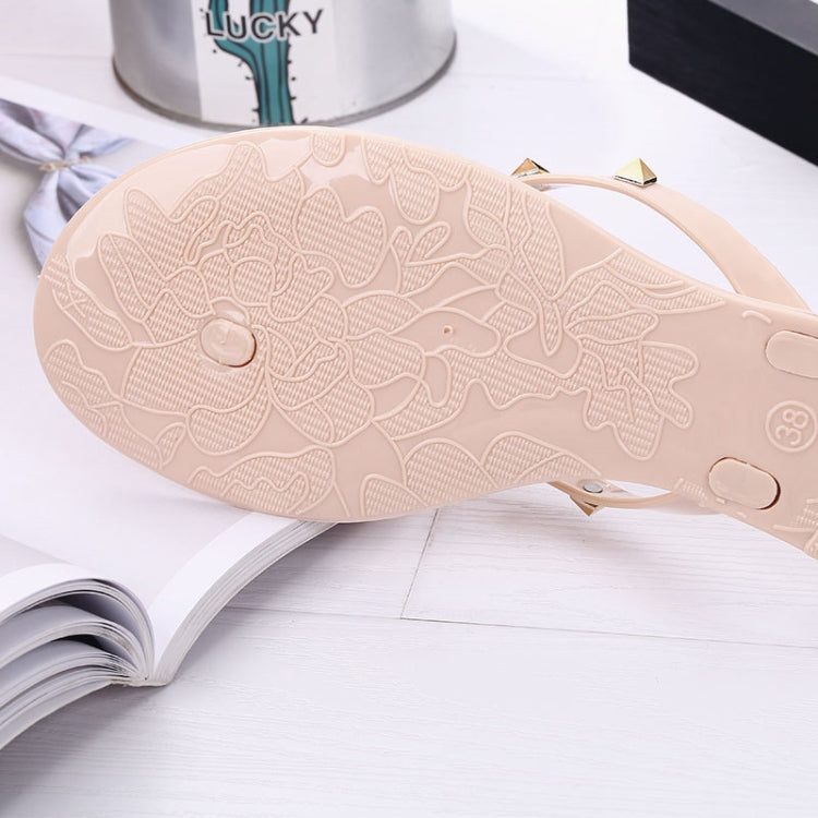 Apricot flip-flop sandal outsole with textured grip and size markings