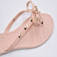 Apricot thong flip-flops with rhinestone-studded bow straps and open toe