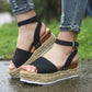 Women’s one-button buckle platform espadrille sandals, black upper with tan sole and buckle