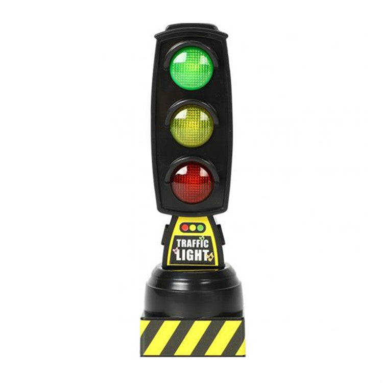 Black toy traffic light with green, yellow, and red signal lights