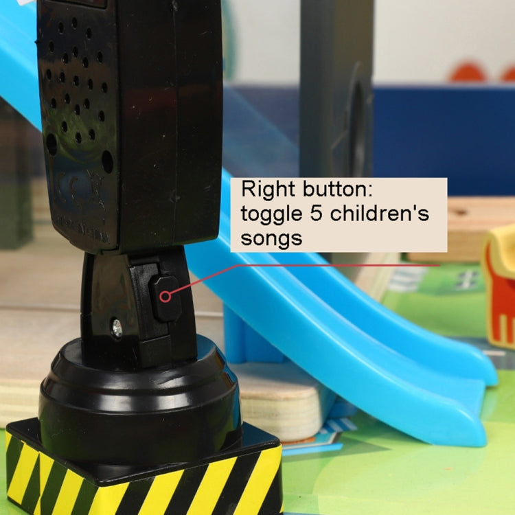 Black toy traffic light side view with control button and base