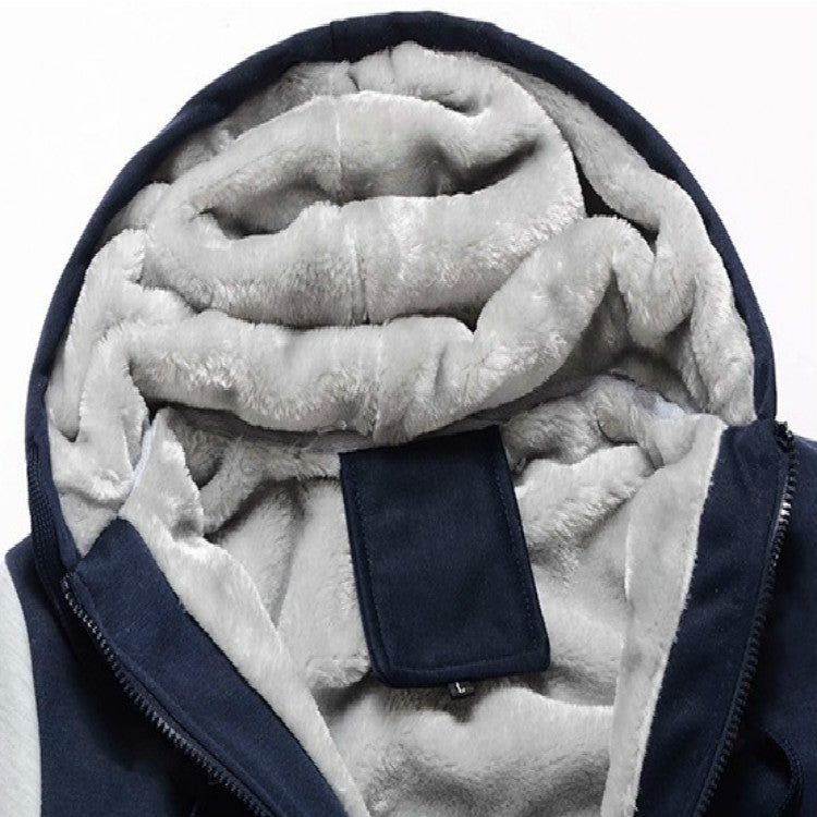 Men's parka hood close-up with thick plush inner lining and dark buttoned neck panel