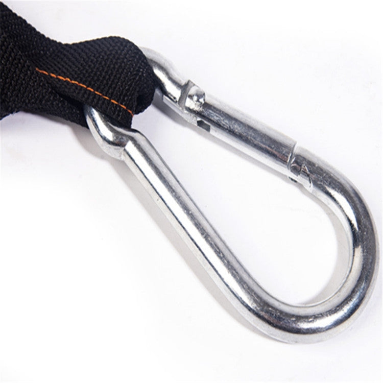 Metal carabiner hook attached to black pull-up training strap