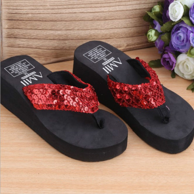 Red sequin thong wedge flip-flops with black footbed and textured platform sole