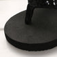 Black wedge flip-flop with fabric toe strap and cushioned platform sole