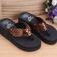 Brown sequin wedge flip-flops with thong straps and black sole